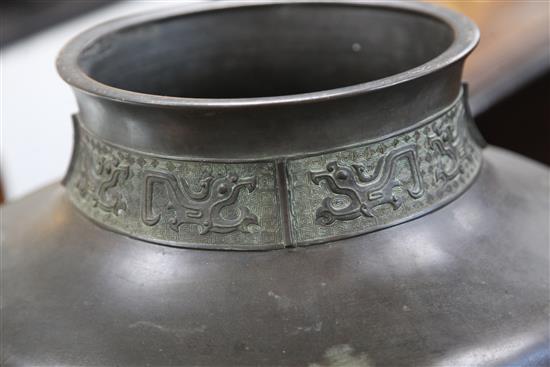 A large Chinese or Japanese archaistic bronze jardiniere, 19th century, height 53cm